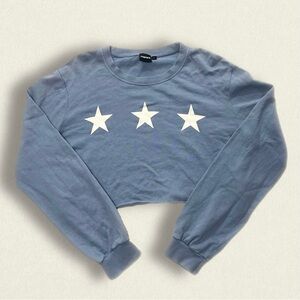 blue cropped long sleeve with stars